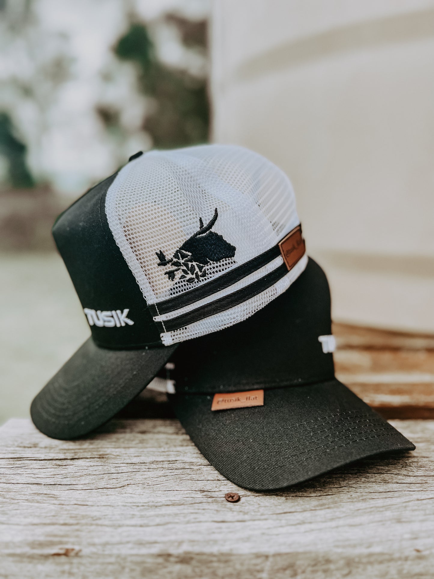 Tusik Bad in Black Cap