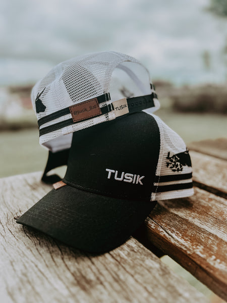 Tusik Bad in Black Cap